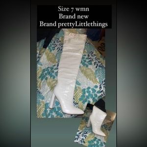 Brand New Out the Box
They are thigh high boots. Never worn or touch the ground